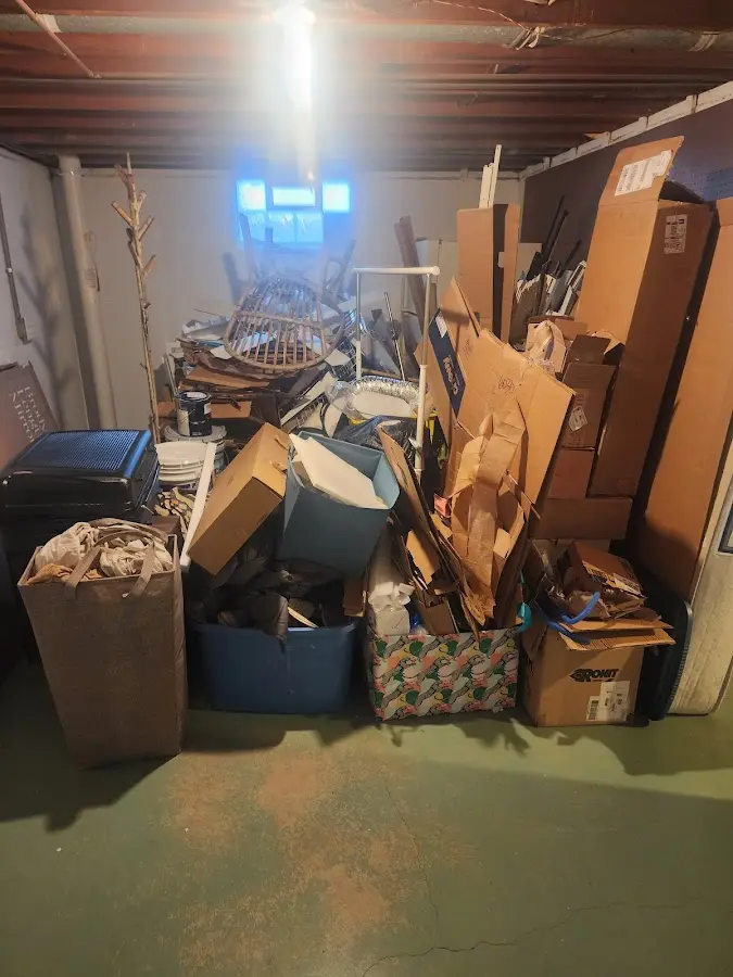 Roll-off dumpster container at job site for Yard Waste Dumpster Rental in Iowa City